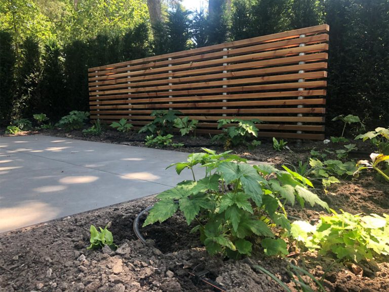 Tuin van vrijstaand huis met luxueuze buitenkamer De Groot Tuinen